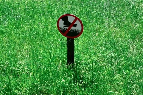 Sign Do not step on grass. Prohibition sign on the lawn. Sign prohibiting Stock Photos
