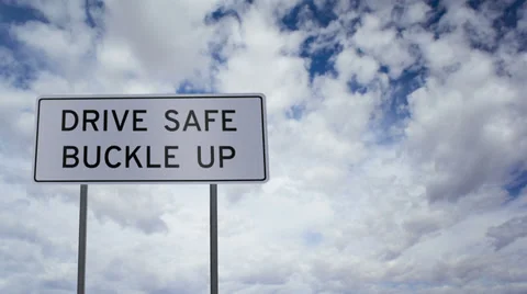Sign Drive Safe Buckle Up Clouds Timelapse Stock Footage