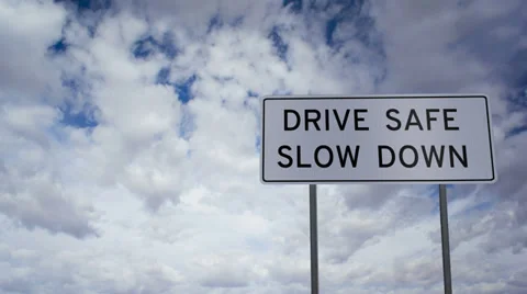 Sign Drive Safe Slow Down Clouds Timelapse Stock Footage 36582073
