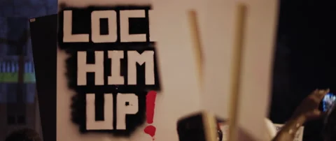 A sign during a political protest Stock Footage 152840876