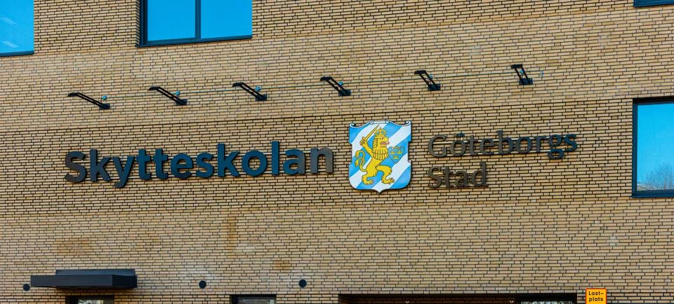 Sign on the facade of Skytteskolan.. Stock Photos