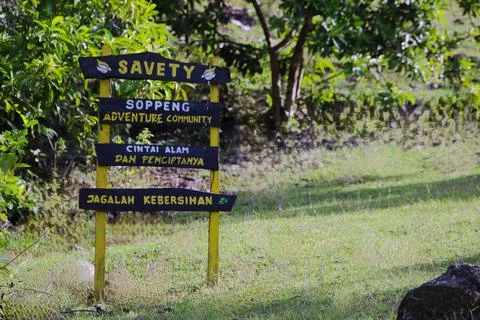 A sign in a field with the word "Safety" on it Stock Photos