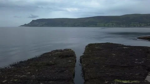 A sign in front of a body of water Stock Footage 155466465