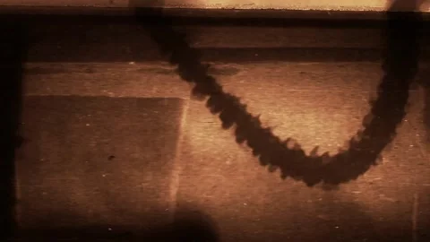 A sign in front of a brick wall 库存影片 157861596