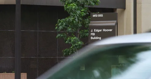 Sign in front of J. Edgar Hoover Building FBI Headquarters, Washington DC. Shot Stock Footage
