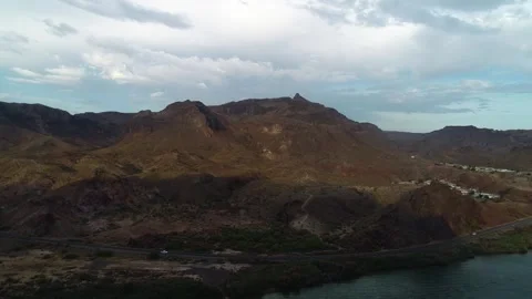 A sign in front of a mountain Stock Footage 156334029