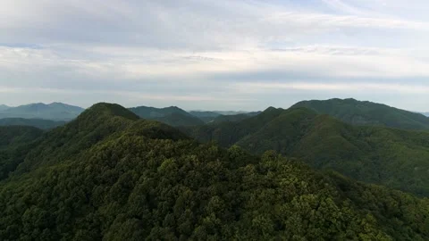 A sign in front of a mountain Stock Footage 156339230