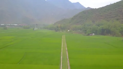 A sign in front of a mountain Stock Footage 156339245