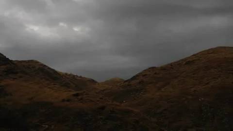 A sign in front of a mountain 스톡 동영상 157752996