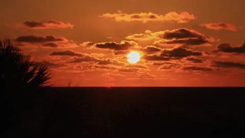 A sign in front of a sunset Stock Footage 156019114