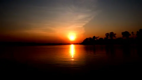 A sign in front of a sunset Vídeos de archivo 157866486