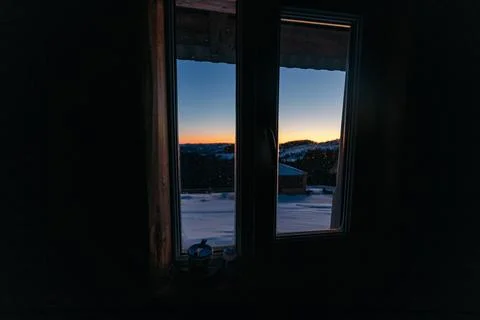 A sign in front of a window Stock Photos