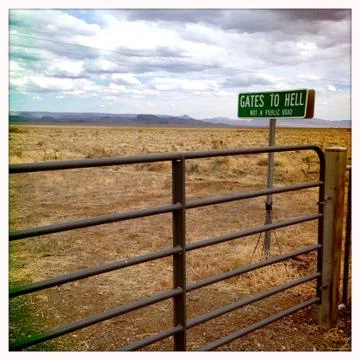 Sign for Gates to Hell in remote landscape Stock Photos