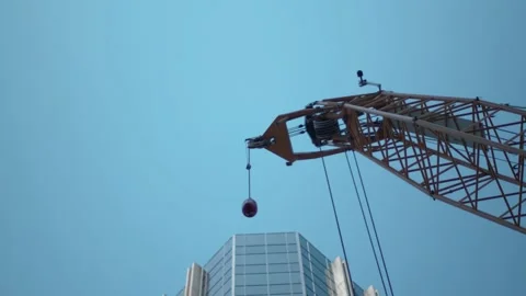 A sign hanging off the side of a building Stock Footage 155539829