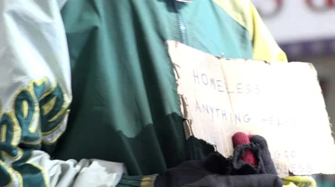 Sign held by homeless man asking for anything that could help 4k Stock Footage 51775845