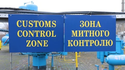 A sign indicating the customs area at the border Stock Footage 124906308