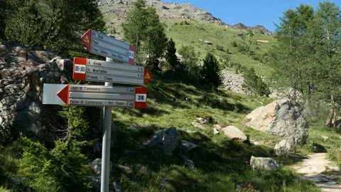 Sign indicating trail on the mountain. Stock Footage 79580226