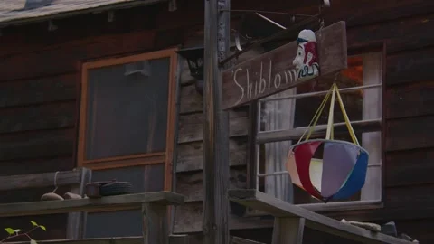 Sign Infront of cabin. Stock Footage 204870255