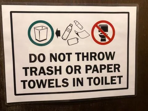 Sign instructing not to dispose of trash or paper towels in toilet, featuring Stock Photos