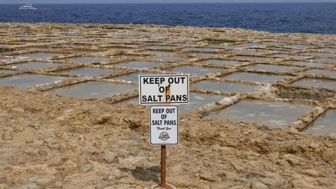 Sign of keep out of salt pans in Malta Mediterranean sea Stock Footage 108390621