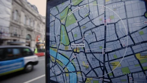 A sign &amp; map in Piccadilly Circus marks how far visitors can walk in 15 minutes Stock Footage 90094459