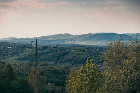 A sign with a mountain in the background Stock Photos