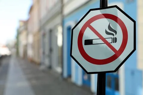 Sign No Smoking on city street. Space for text Stock Photos