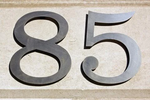 Sign for number eighty five Stock Photos