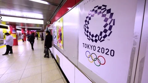 Sign of Olympic Games at subway platform that will take place in Tokyo in 2020 Stock Footage