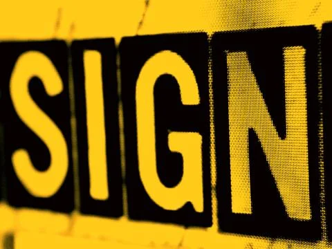 Sign in orange Stock Photos