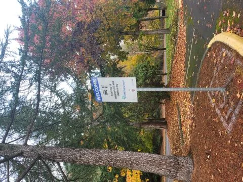 Sign post for Covid Testing Stock Photos