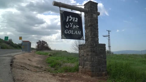 Sign post entering the region of the Golan Heights in Israel Stock Footage 149322045