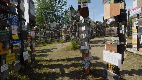The Sign Post Forest of Watson Lake along the Alaska Highway in Canada Stock Footage 124229743