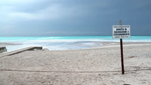 Sign prohibiting bathing and standing or loitering. Polluted Water off limits Video stock 158414916