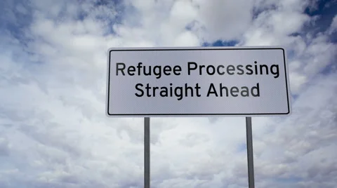 Sign Refugee Processing Ahead Clouds Timelapse Video stock 57375016