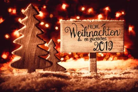 Sign, Rustic Tree, Snow, Calligraphy Glueckliches 2019 Means Happy 2019 Stock Photos