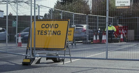 Sign saying Covid Testing at a newly opened walk-through testing facility Stock Footage 149222094