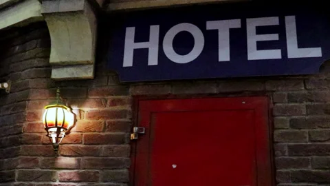 A sign that says Hotel on the wall Stock Footage 267001807