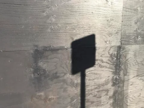 Sign Shadow on Wall Foto stock