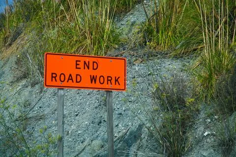 A sign on the side of the road Stock Photos