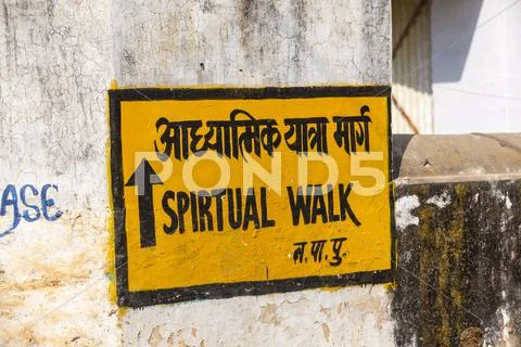 Sign spiritual walk at the wall Stock Photos