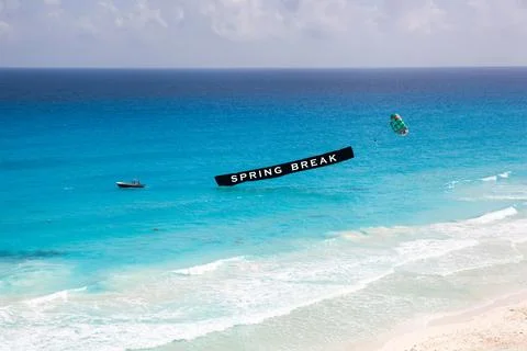 Sign Spring Break on Advertisement beach parachute boat Stock Photos