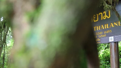 Sign at the summit of Thailand's highest mountain in Doi Inthanon National Park Stock Footage 113109371