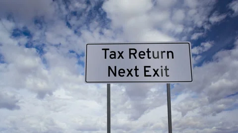 Sign Tax Return Next Exit Clouds Timelapse Stock Footage 45780949