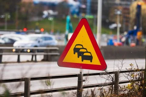 Sign warning for risk for queues. Stock Photos