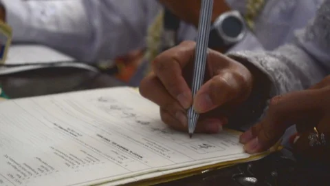 Sign on wedding certificate Stock Footage 120906338