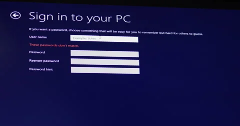 Sign in to your PC choose the User Name Tim Cook and password hint I love Stock Footage 235923414