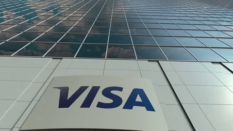 Signage board with Visa Inc. logo. Modern office building facade time lapse Stock Footage