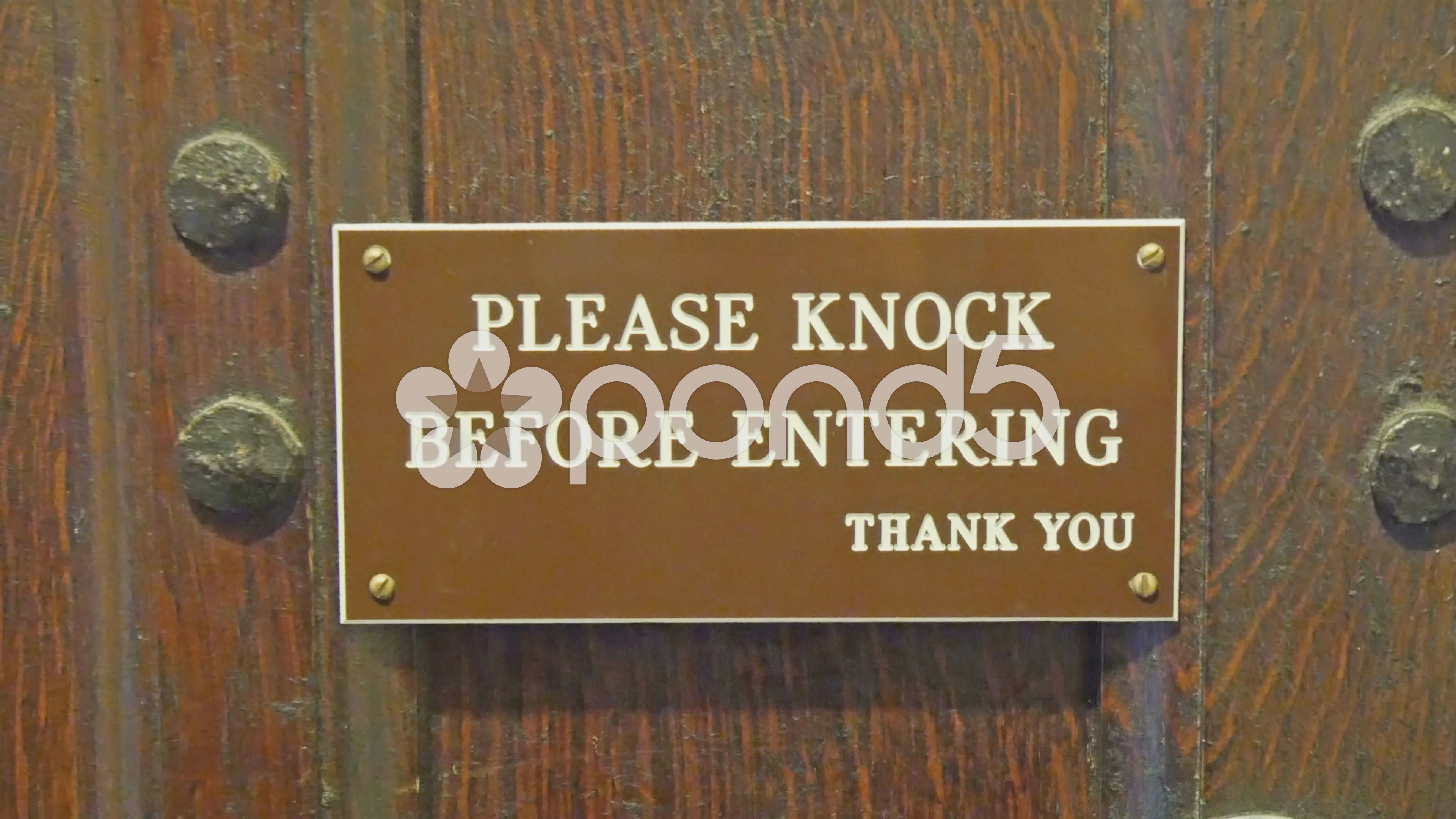 A Signage On The Door Saying Knock First Footage 47473073