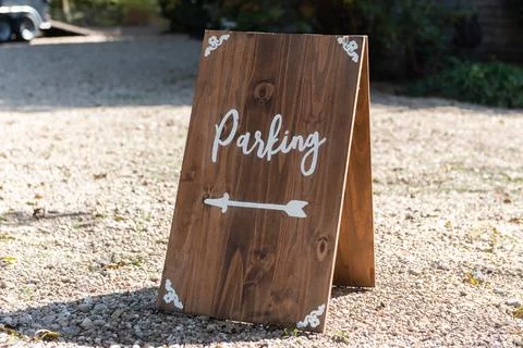 Signage at the event points the way. Stock Photos